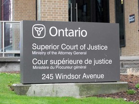 A sign at the Superior Court of Justice building in Windsor in April 2020.
