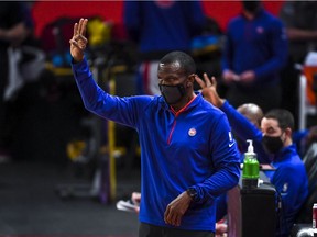 Head coach Dwane Casey of the Detroit Pistons signals during the first quarter against the Memphis Grizzlies at Little Caesars Arena on May 06, 2021 in Detroit, Michigan.