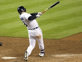 Robbie Grossman of the Detroit Tigers singles in the ninth inning to drive in Niko Goodrum and defeat the Kansas City Royals 8-7 at Comerica Park on May 11, 2021, in Detroit, Michigan.