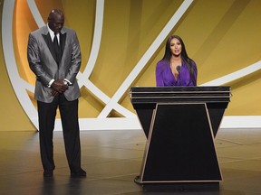 Vanessa Bryant, wife of the late Kobe Bryant with presenter Michael Jordan, speaks on his behalf during the Naismith Memorial Basketball Hall of Fame Enshrinement ceremony at Mohegan Sun Arena.