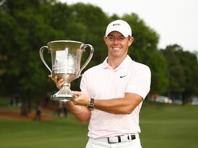 Rory McIlroy poses with the trophy after winning the Wells Fargo Championship at Quail Hollow Club on Sunday in Charlotte, N.C.