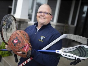 University of Windsor Professor Chad Sutherland, pictured outside his home on Friday, is part of a national research team looking to make physical activity more inclusive and equitable for all Canadians.