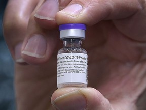 A vial of the Pfizer-BioNTech COVID-19 vaccine is shown on Monday, May 3, 2021, at the St. Clair College SportsPlex field hospital in Windsor, Ontario.