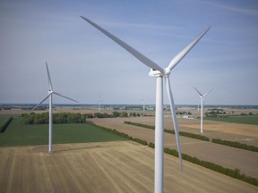 Wind turbines are seen north of County Rd. 50 in Essex on Thursday, May 20, 2021. Essex County council approved a multi-year plan on May 19 to pursue major efficiencies in local energy consumption.