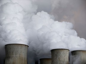 Steam rises from the cooling towers of the coal power plant of RWE, one of Europe's biggest electricity and gas companies in Niederaussem, Germany,  March 3, 2016.