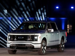 The all-electric Ford F-150 Lightning pickup truck is unveiled at the company's world headquarters in Dearborn, Michigan, U.S., May 19, 2021.