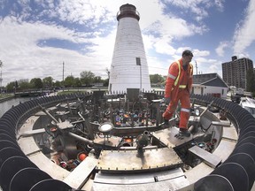 A City of Windsor employee prepares the Peace Fountain at Lakeview Park Marina on May 10, 2021. The fountain is due for installation at Coventry Gardens in mid-May.