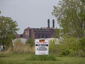 A 'Sold' sign is seen on empty land on the corner of Russell Street and Mill Street in Sandwich, on Monday, May 17, 2021.