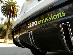 FILE PHOTO: A Chevrolet Equinox Fuel Cell test vehicle is seen in Los Angeles June 10, 2008. General Motors Corp (GM) said on Wednesday it was partnering with Clean Energy Fuels Corp on a new hydrogen refueling station in Los Angeles that the companies hope will be the first of many. The new fueling station will be used by drivers taking part in GM's Los Angeles-area test of its Chevy Equinox Fuel Cell vehicle, the company said. Picture taken June 10, 2008.