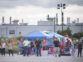 Unifor scored an arbitration victory Thursday in its fight against the closure of a Windsor auto parts plant. Here, picketers are shown blocking the entrance to the local Nemak plant on Sept. 5, 2019, following a judge's order that the barricades removed.