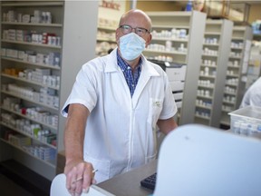 "Answering phone calls nonstop." Gary Willard, a pharmacist at Ziter Pharmacy on Howard Avenue, is shown Wednesday, May 26, 2021.