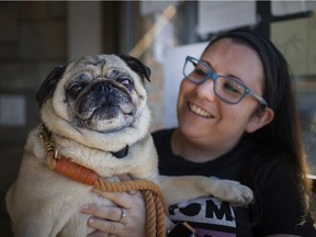 Jen Boutet is pictured with her pug, Franklin, on Wednesday, May 12, 2021.