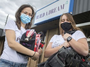 Rebecca Chenier, left, and Delaney Krieger, are pictured outside the offices of Build A Dream, on Saturday, May 8, 2021.