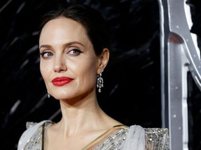 Actor Angelina Jolie poses as she attends the UK premiere of "Maleficent: Mistress of Evil" in London, Britain October 9, 2019.