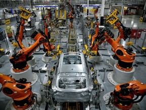 Autonomous robots assemble an X model SUV at the BMW manufacturing facility in Greer, South Carolina, U.S. November 4, 2019.