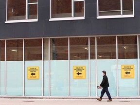 Signs lead the way to the entrance of the vaccination centre at Windsor Hall (167 Ferry St.) in downtown Windsor on April 27, 2021.