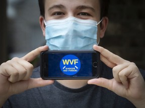 Noah Gascon, an organizer for WindsorVax Finders, displays the logo on his mobile device outside his home on Thursday, May 6, 2021.