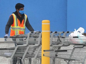 A worker at the Walmart location in Windsor's east end in September 2020.