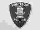Windsor Police Service insignia on a report cover.