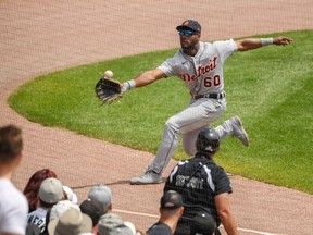Akil Baddoo of the Detroit Tigers attempts to catch a fly ball in the second inning against the Detroit Tigers at Guaranteed Rate Field on June 06, 2021 in Chicago, Illinois.