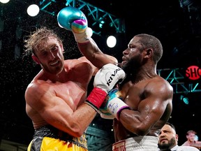 Floyd Mayweather Jr. fights Logan Paul during an exhibition boxing match at Hard Rock Stadium. Mandatory Credit: