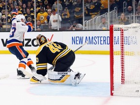 Islanders forward Casey Cizikas scores the game-winning goal in the first overtime to defeat the Bruins 4-3 in Game 2 of the second round of the 2021 Stanley Cup Playoffs at the TD Garden in Boston, Monday, May 31, 2021.