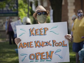 A small group of close to three dozen people held a rally to prevent the closing of Adie Knox, on Thursday, June 17, 2021.