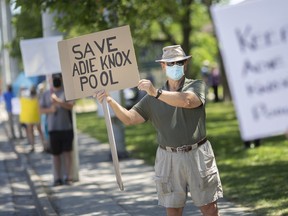 Lionel Croteau participates in a rally with approximately 30 other people to prevent the closing of Adie Knox, on Thursday, June 17, 2021.