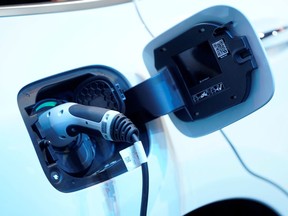 FILE PHOTO: A charging port is seen on a Mercedes Benz EQC 400 4Matic electric vehicle at the Canadian International AutoShow in Toronto, Ontario, Canada, February 13, 2019.