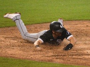 Chicago White Sox second baseman Danny Mendick scores a run on a walk-off sacrifice fly during the tenth inning against the Detroit Tigers at Comerica Park.