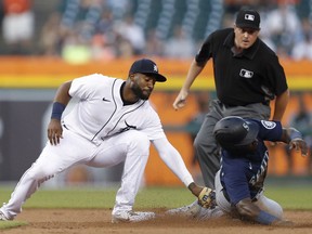 Detroit Tigers shortstop Niko Goodrum tags out Seattle Mariners center fielder Taylor Trammell during the sixth inning at Comerica Park.