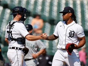 Detroit Tigers catcher Jake Rogers (34) and starting pitcher Gregory Soto (65) celebrate after defeating the Seattle Mariners at Comerica Park.