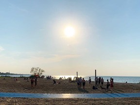 Hot, sunny weather brought people to Lakeshore's West Beach in Belle River on June 5, 2021.
