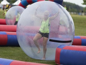 Due to COVID-19, this year's Windsor Corporate Challenge had to be done differently. In this June 16, 2017, file photo, Greenshield employee Rachel Janzen shows the kinds of shenanigans that are common in the event during non-pandemic years.