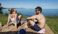 Olivia and Corey enjoying the summertime view on Lake Ontario as seen from Cliff Lumsdon Park, in the Etobicoke on Saturday, June 12, 2021.