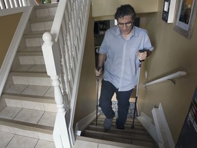 Domenic Scandale is shown at his Windsor home on Thursday, June 3, 2021. Scandale got COVID-19 in December 2020 and then remained hospitalized until April because of long-term impacts.