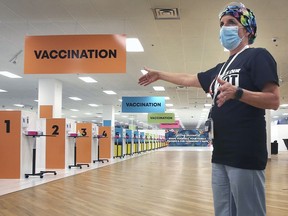 Karen Riddell, Windsor Regional Hospital Chief Nursing Executive/Chief Operating Officer gives a media tour of the new Devonshire Mall Vaccination Centre on Friday, June 18, 2021.