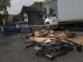 Windsor police hold the scene of an early morning fire on the 300 block of Tuscarora Street on Saturday, June 19, 2021.