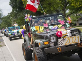 School's out! Approximately 60 vehicles decorated in balloons and signs paraded down Laurier Drive in LaSalle as graduating students at Sandwich Secondary School celebrated the end of their high school years on Tuesday, June 29, 2021, the last day of classes.