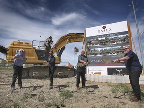 Remo Valente, left, and Peter Valente, of Valente Development Corporation, along with Larry Snively, mayor of Essex and Richard Meloche, deputy mayor participate in a ground breaking ceremony on Wednesday, June 16, 2021 where the company has started a 500 plus unit residential development.