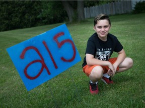 "I was heartbroken." Angelo Lucier, 11, is shown outside his home on Friday, June 11, 2021. He's calling on the federal government to enact changes to improve the lives of Indigenous Canadians after the remains of 215 children were found in unmarked graves at the Kamloops Indian Residential School.