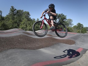 The City of Windsor officially opened the first asphalt bicycle pump track at the Little River Corridor on Tuesday, June 22, 2021. Ryan Bertrand, 14, takes a spin on the track.