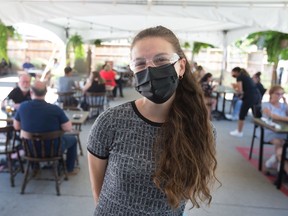 "We have amazing guests." Nicole Thompson, manager of the Thompson House, stands beneath the Windsor restaurant's packed covered patio on the first day of in-person dining under Step 1 of the province's reopening plan, Friday, June 11, 2021.