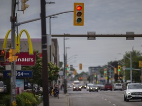 Traffic lights at the intersection of Wyandotte Street East and Goyeau Avenue are seen on Thursday, June 24, 2021. The city is poised to have red-light cameras ready to go by Labour Day.