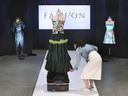 St. Clair College Fashion Design Technician program coordinator and professor Elaine Chatwood adjust a dress during the Virtual Atelier Fashion Show at the school on Tuesday, June 15, 2021. Due to pandemic restrictions a robot was used to showcase designs of graduating students.