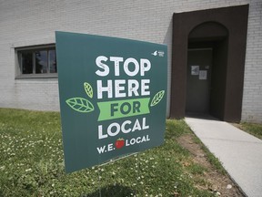 A sign encouraging support of local businesses is shown in Windsor on Friday, June 4, 2021. The initiative is sponsored by the Tourism Windsor Essex Pelee Island organization.