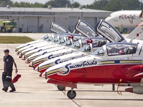 Parking in Windsor, flying in Michigan. The Snowbirds, officially known as 431 Air Demonstration Squadron of the Royal Canadian Air Force, sit parked on the runway at Windsor International Airport, on Friday, June 11, 2021. They're here for the weekend but demonstrating their aerial formation skills in Ypsilanti.