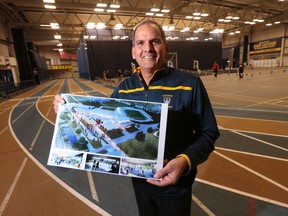 It's been a marathon since this Dec. 3, 2015, file photo, when Michael Khan, Dean of Human Kinetics at the University of Windsor, was shown at the St. Denis Centre with a rendering of the proposed project. Completion is now in sight.