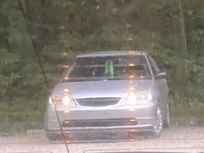 Essex County OPP are looking to speak with the owner of this older model silver sedan seen parked at the Maidstone Conservation Area on Monday, June 21, 2021, at 8:17 p.m.