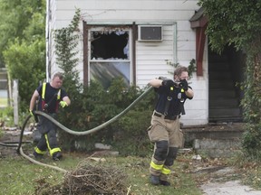 Windsor firefighters are shown at the scene of a house fire in the 700 block of Windsor Avenue on Wednesday, June 23, 2021. The home was not occupied and no injuries were reported. The fire broke out at approximately 9:00 a.m.